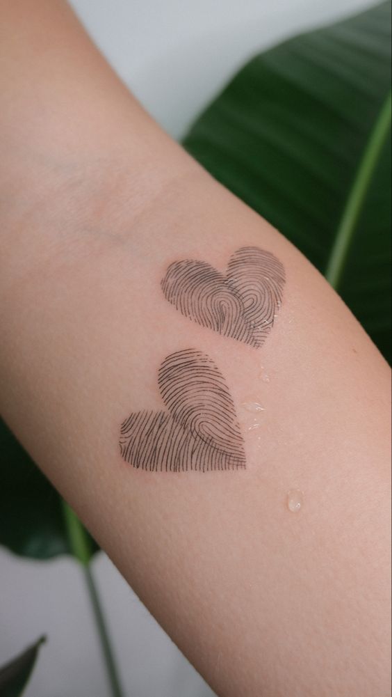 Heart-shaped fingerprint tattoo | Fingerprint heart tattoos, Fingerprint  tattoos, Thumbprint tattoo