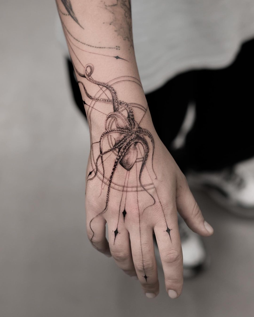 geometric octopus tattoos by ulassyesilyurt