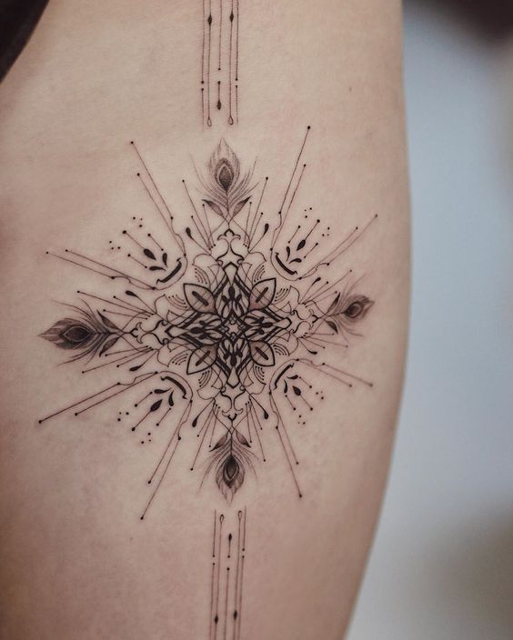 geometric snowflake tattoo