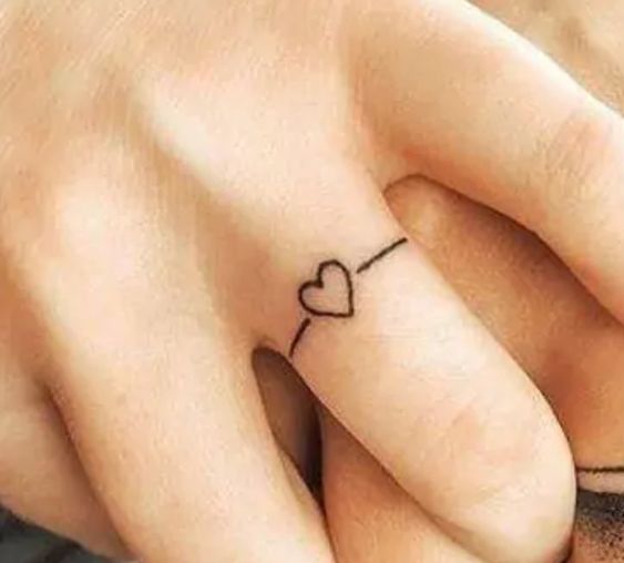heart ring tattoo