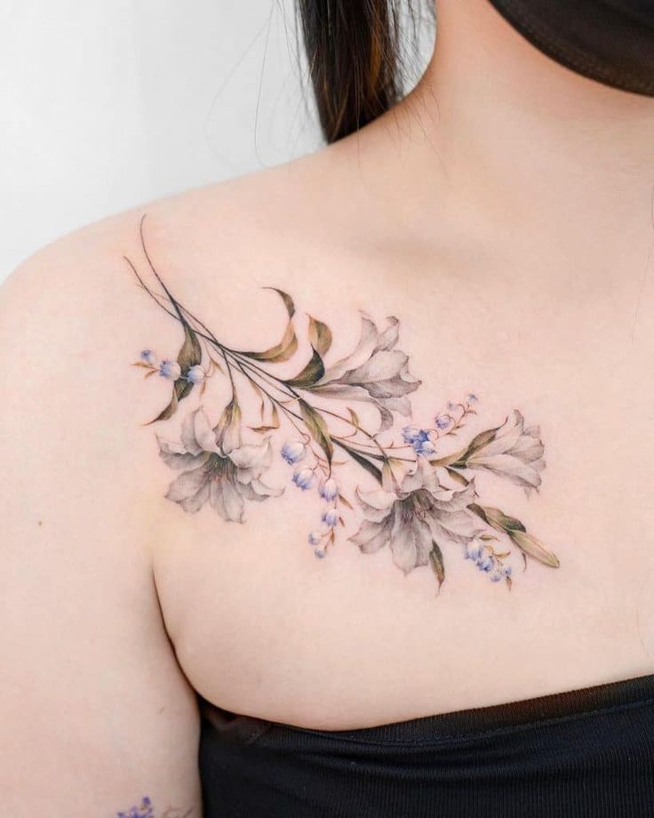 lily tattoo on shoulder