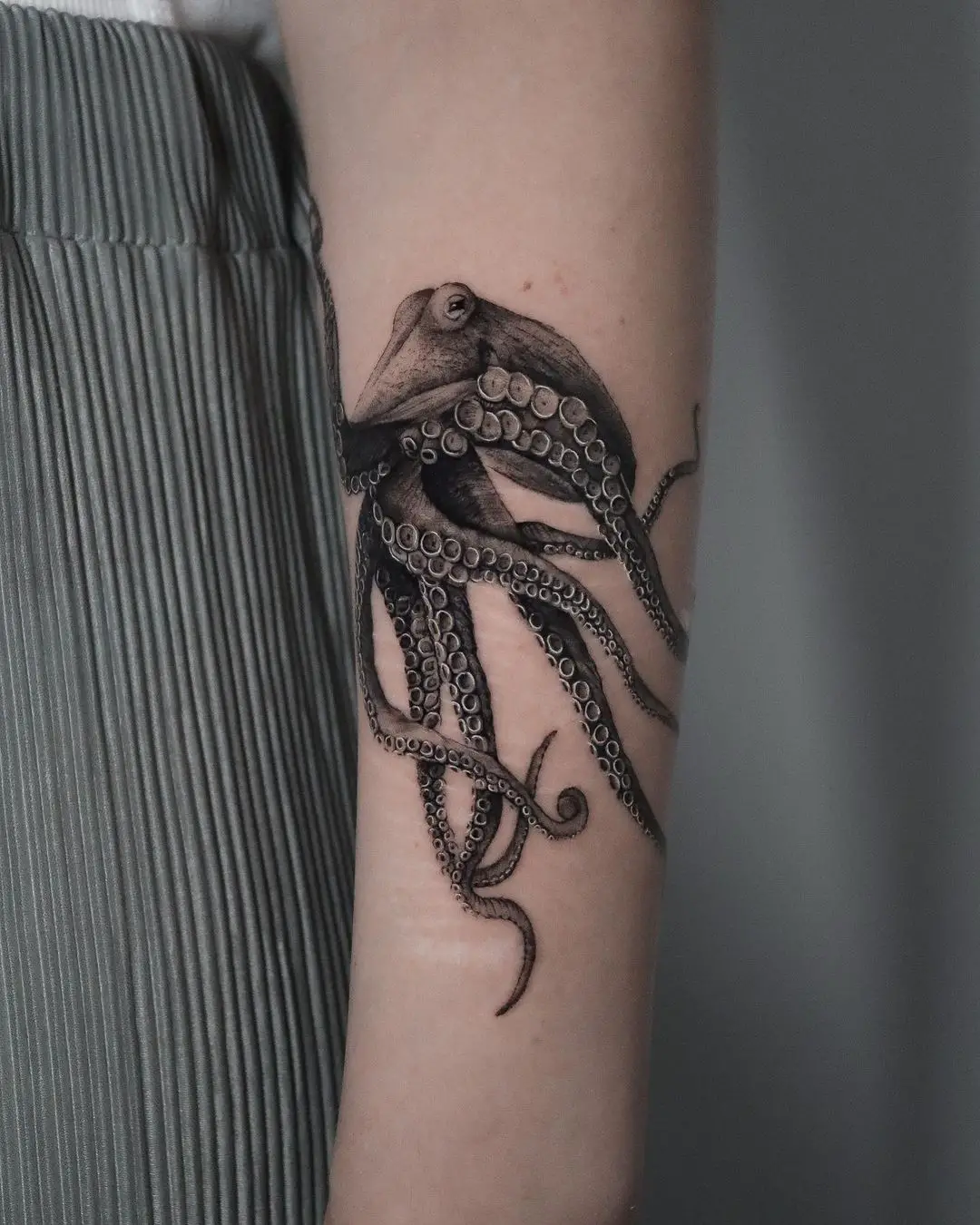 octopus on forearm by ivanruotolo.ink