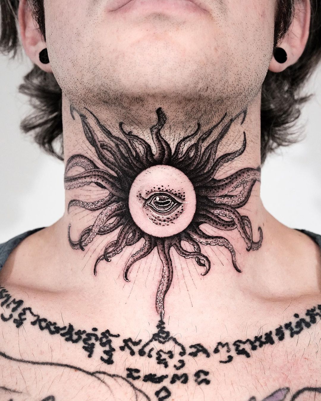 octopus tattoo on neck by tattooer intat