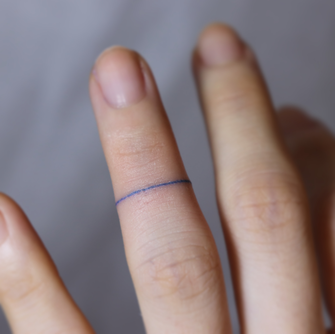 simple ring tattoo for men by tattooist hyojin