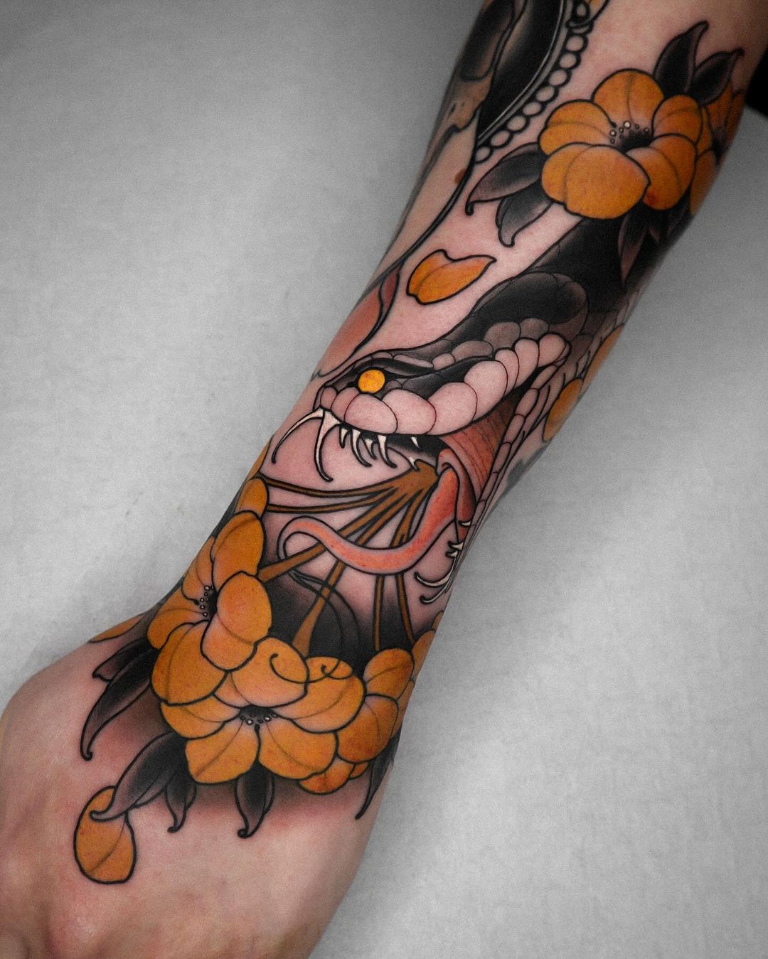 snake tattoos by robin.kemper.tattoo