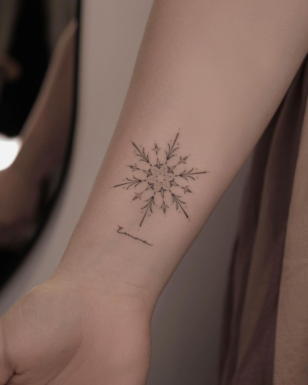 snow tattoo for men on forearm by monochrom.ink