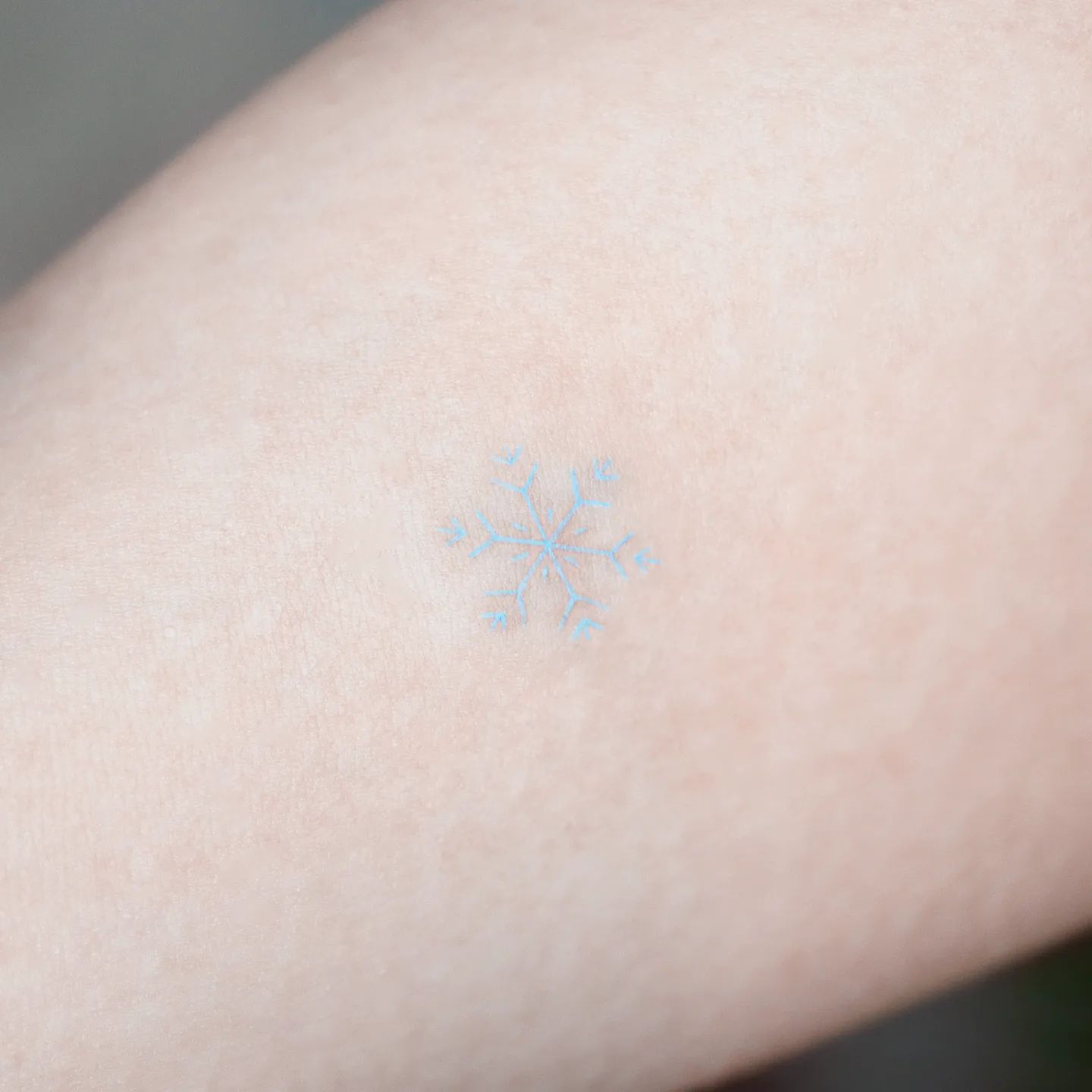 tiny snowflake tattoo design by tattooist namoo