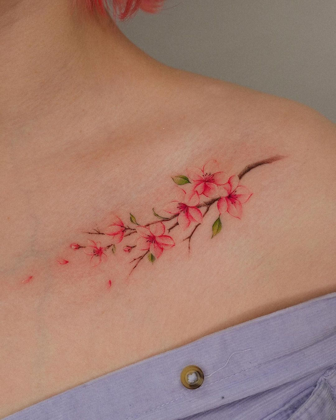 watercolor floral tattoo by suya ink