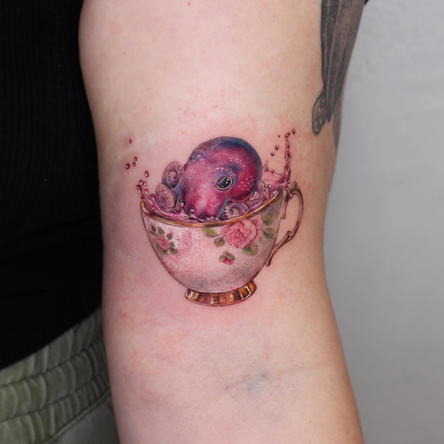 watercolor octopus tattoo by sang.tattoos