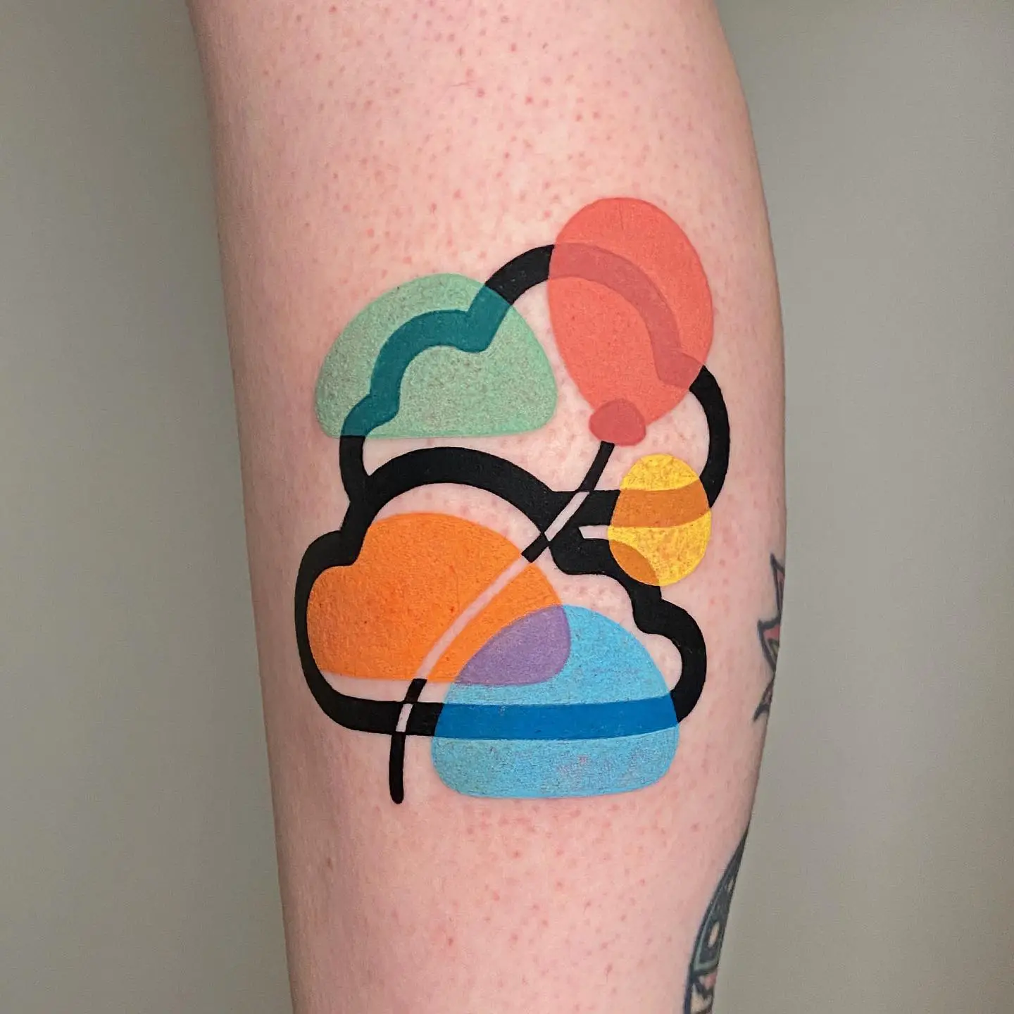 colorful balloon tattoo by mambotattooer