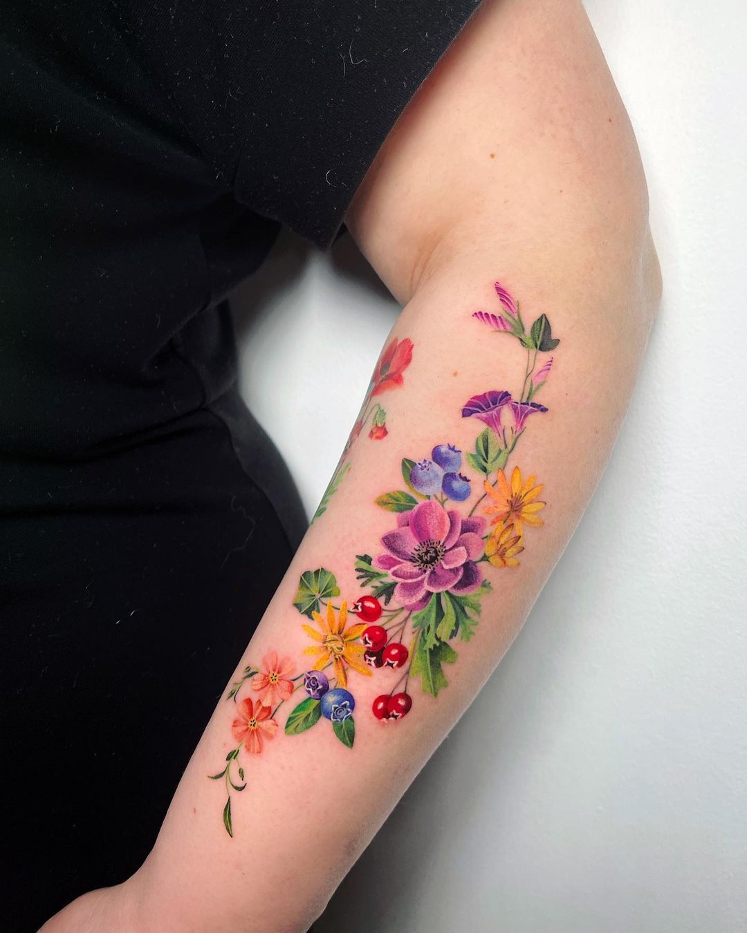 colorful spring tattoo by ciotka zu tattoo