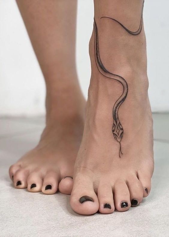 small snake tattoo