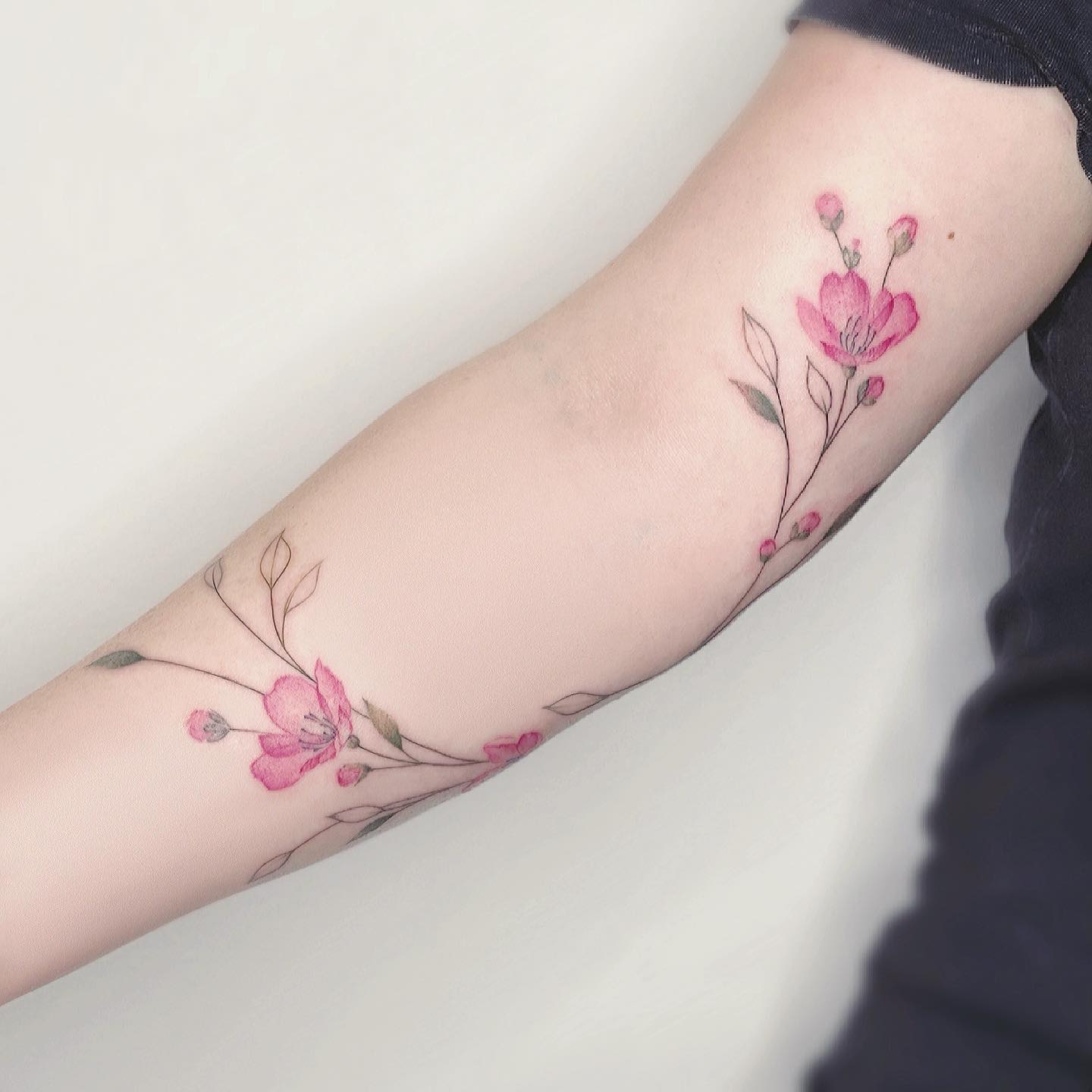 watercolor flora tattoo by eva tattooist
