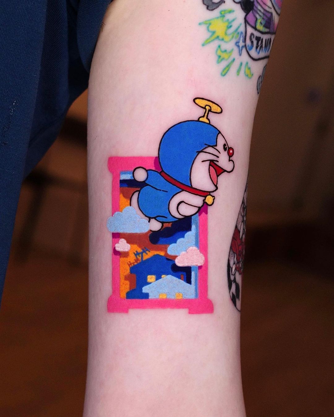 Doraemon tattoo on forarm by zoonmo