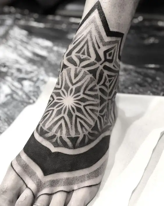 Mandala feet tattoos