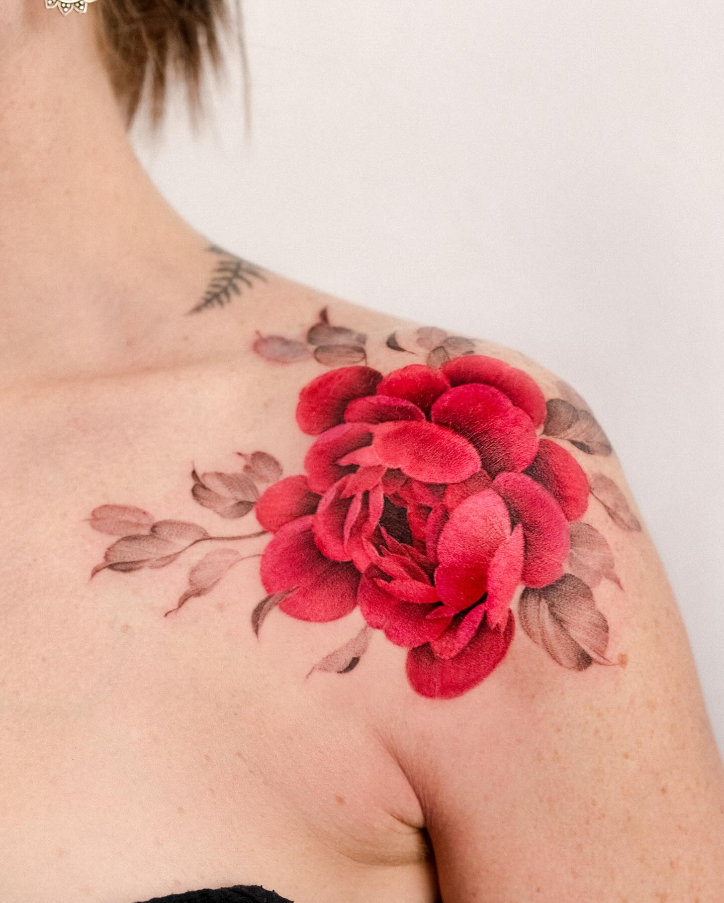 Red ink flower tattoo by mo.no .tattoo