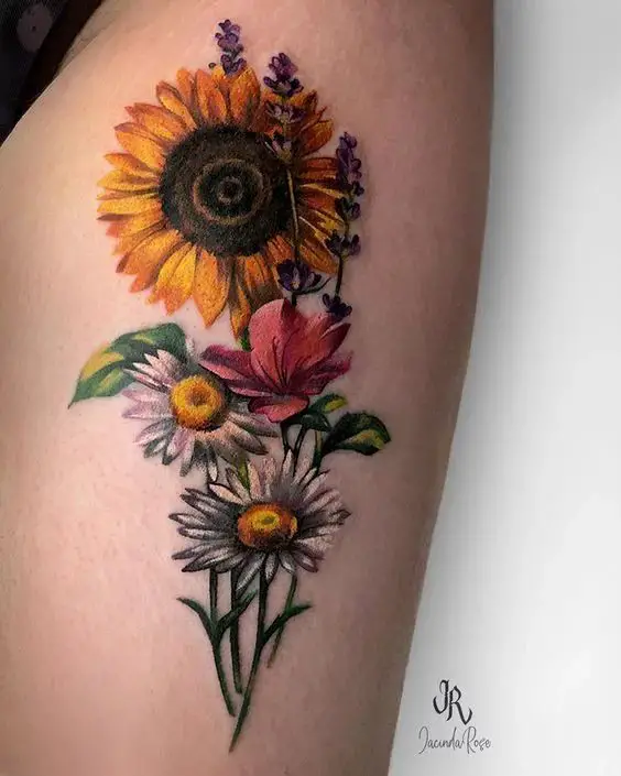 Sunflower tattoos on the thighs