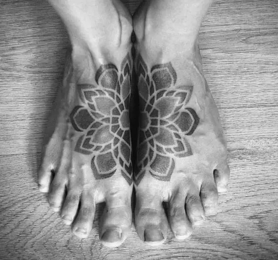 black inked feet tattoos