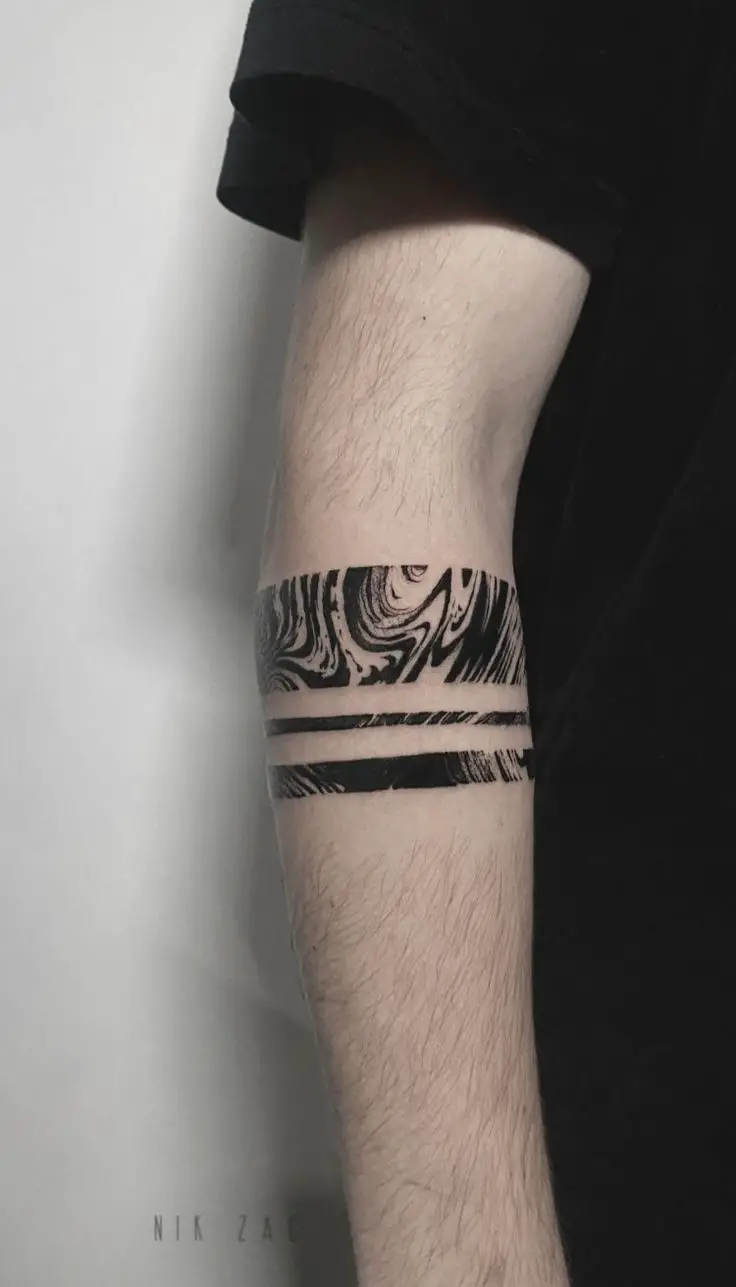 minimal abstract tattoo on forearm