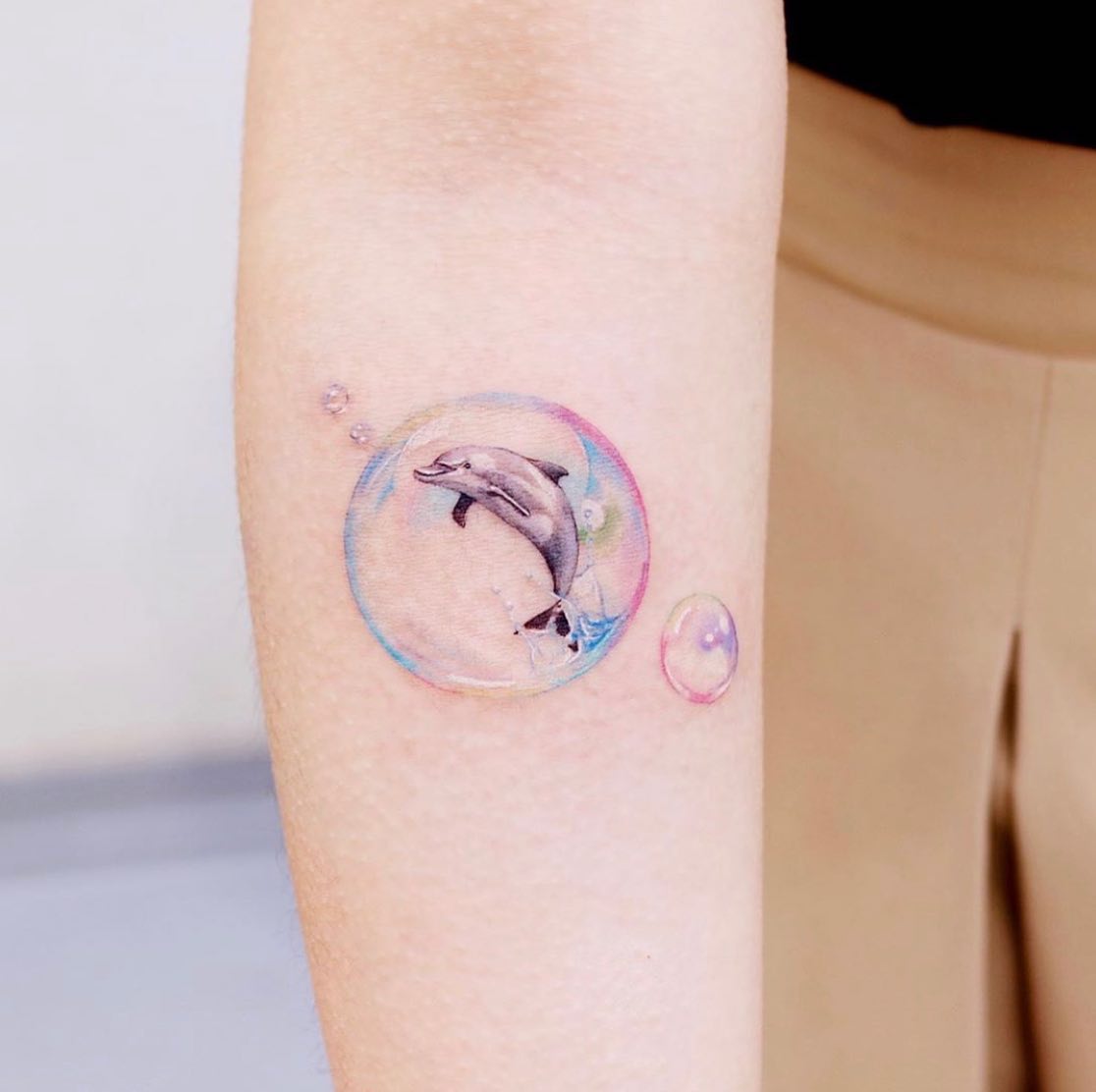 realistic dolphin tattoo by vismstudio