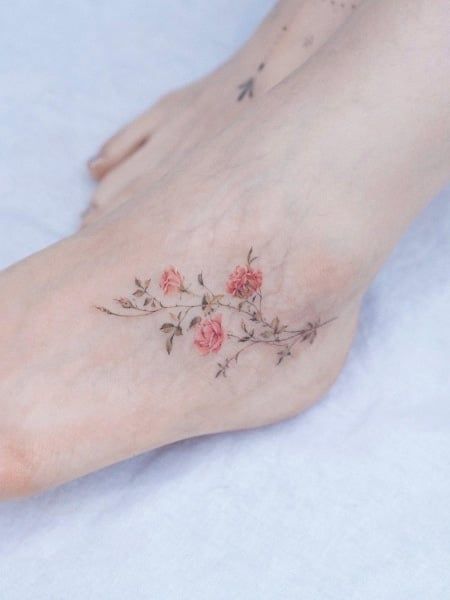 rose tattoos on foot