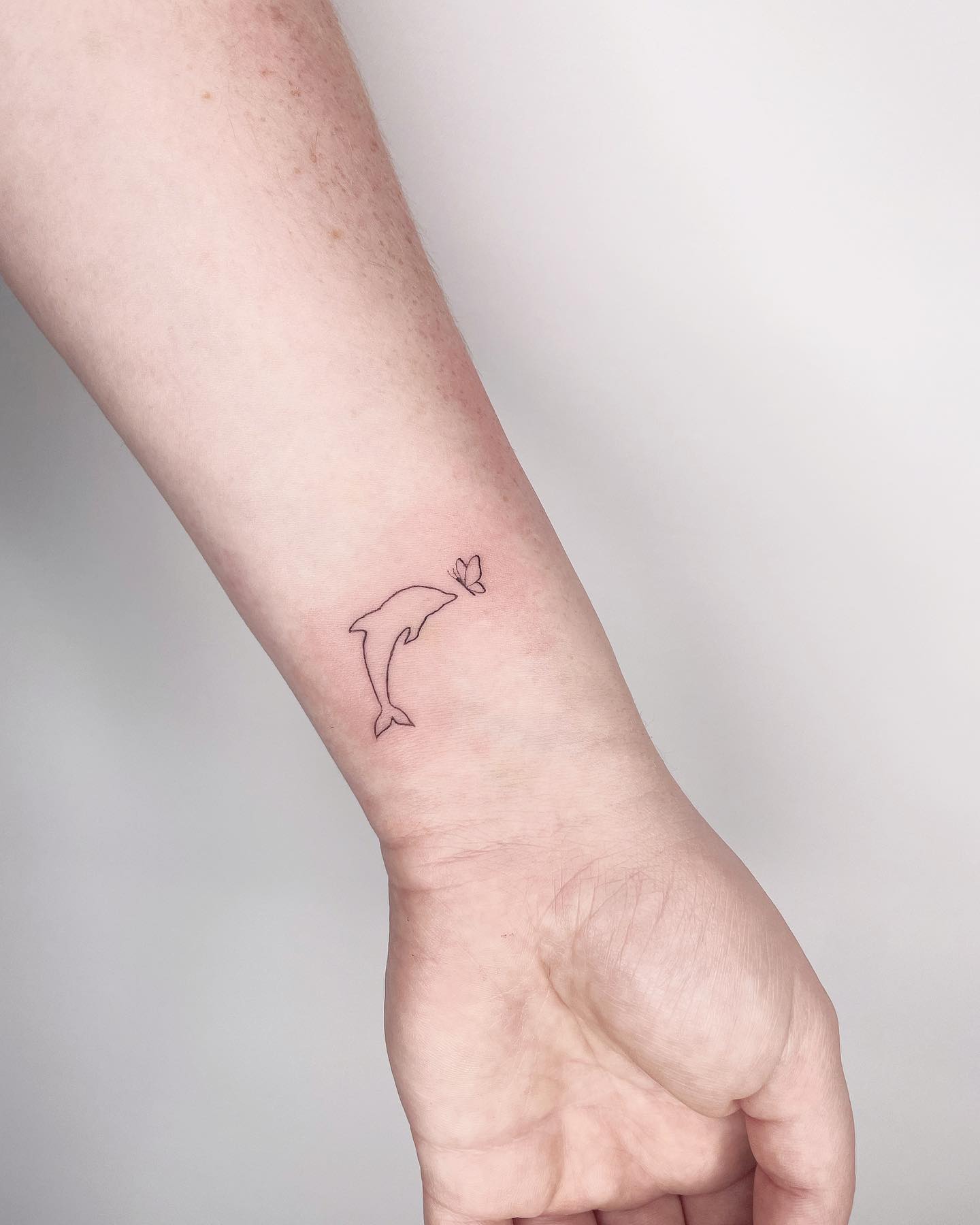 single line dolphin ideas by beckydonnellytattoo