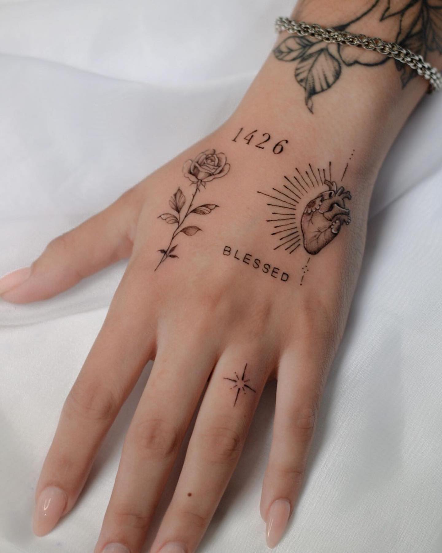 Small hand tattoos by pardonparis