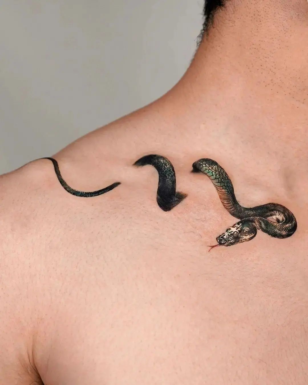Snake collarbone tattoo by vrise.viral