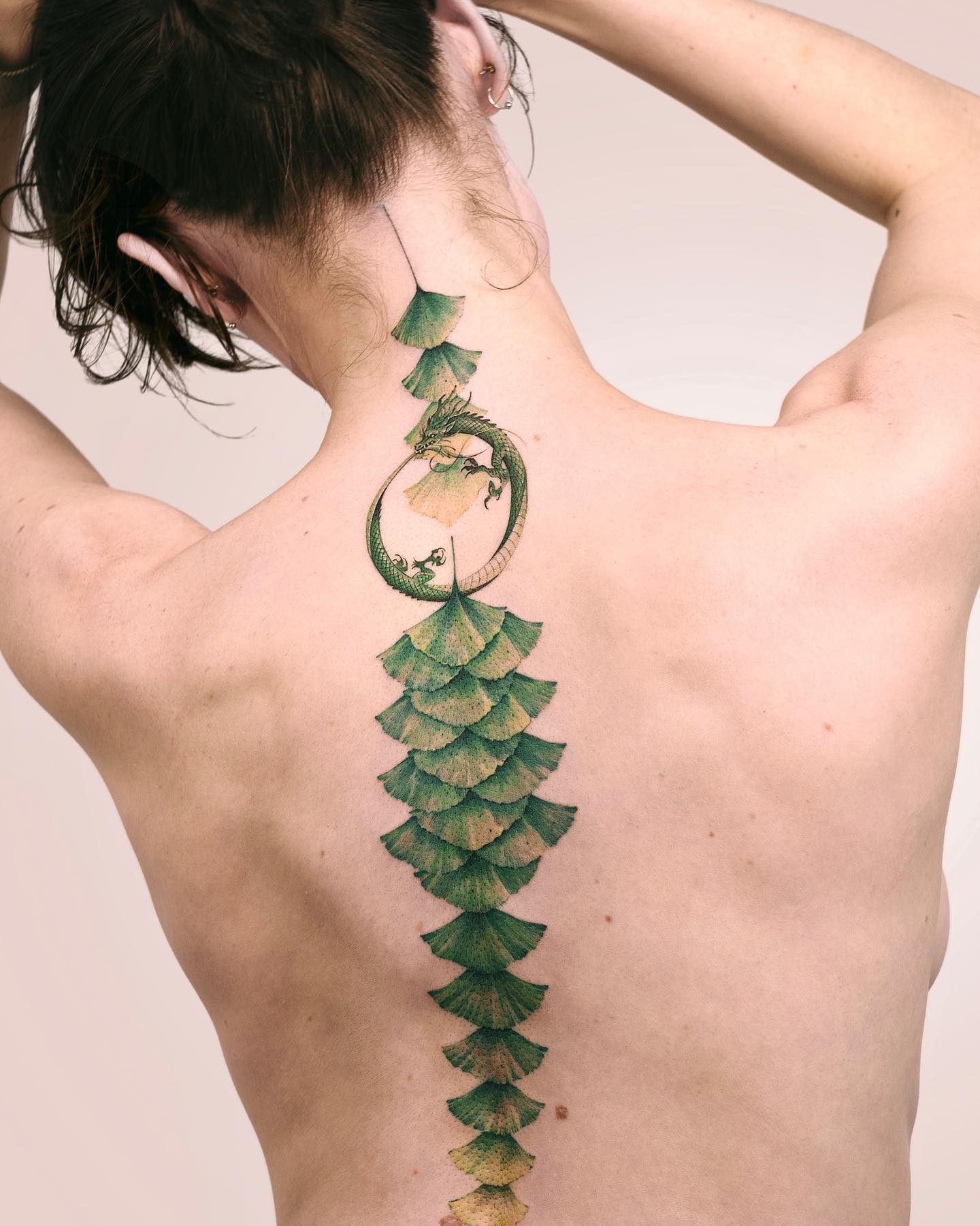 Uniqe spine tattoo by soltattoo