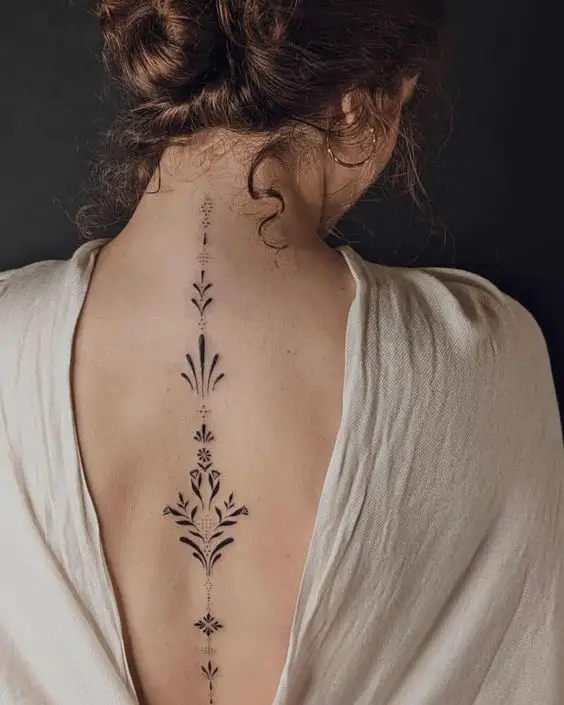mandala spine tattoos