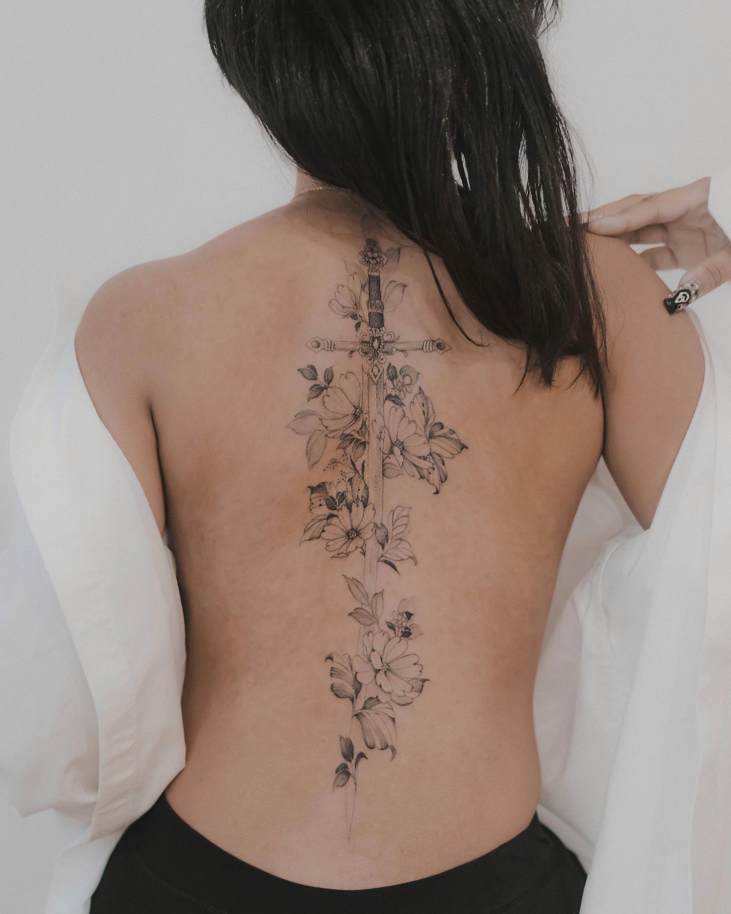 spine tattoos by unloveable.nyc