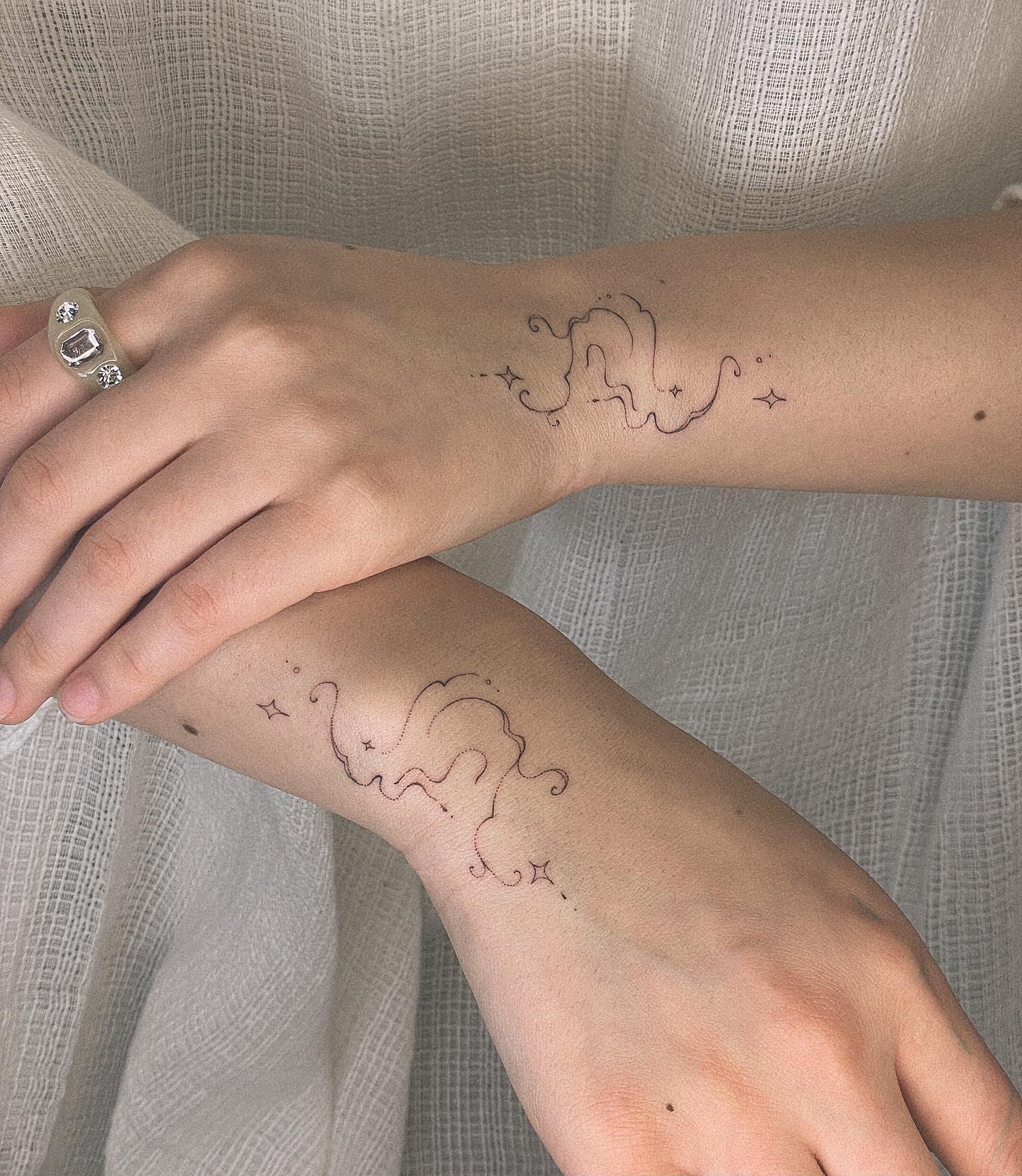 wrist elegant tattoo by bobbiberry