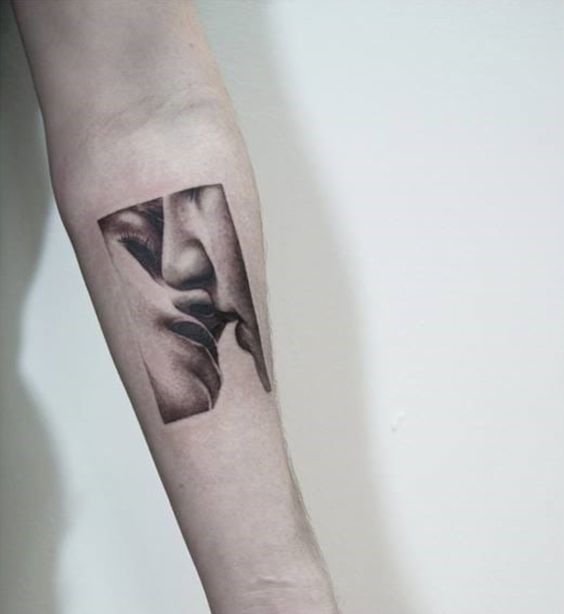 Black and grey tattoo on the forearm