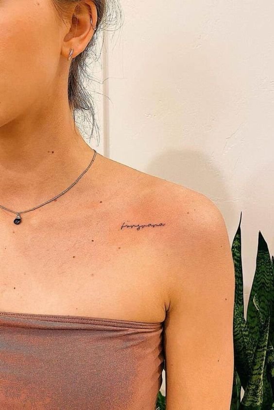 Collarbone alphabets tattoos