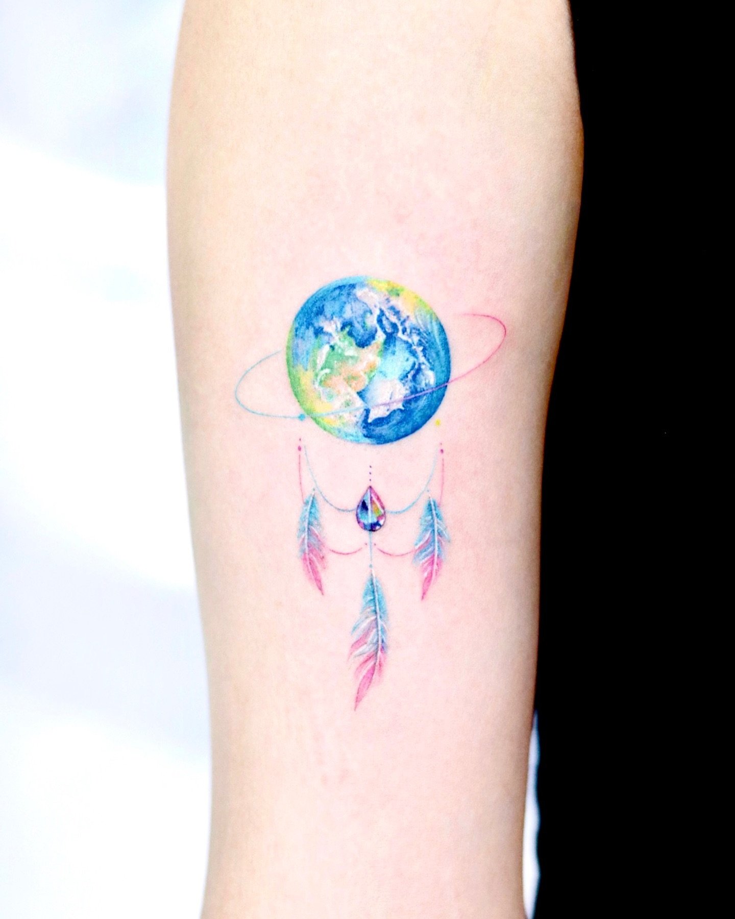 Colorful earth tattoos by kico.tattoo