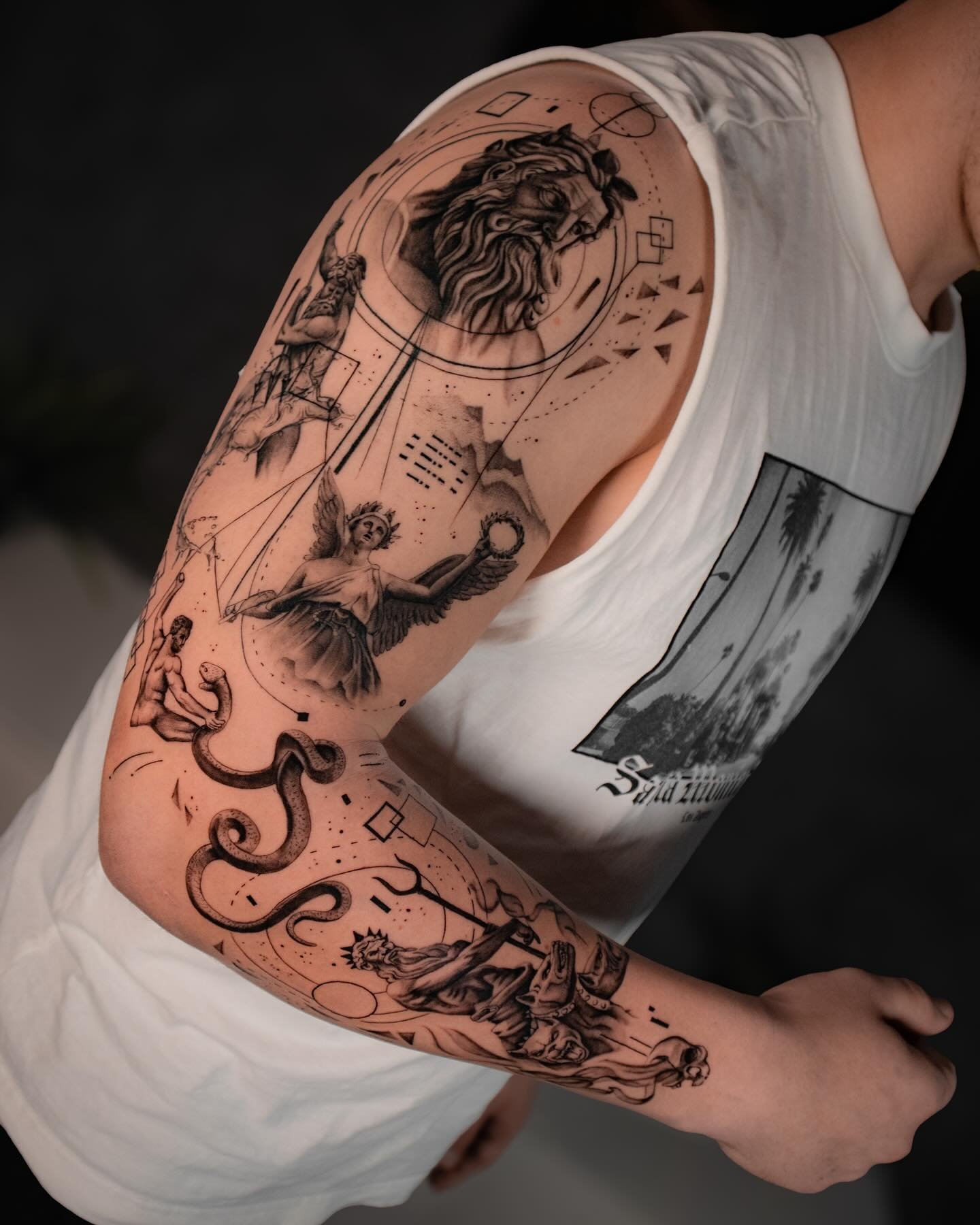 Detailed full arm tattoos for men by odb blackwork