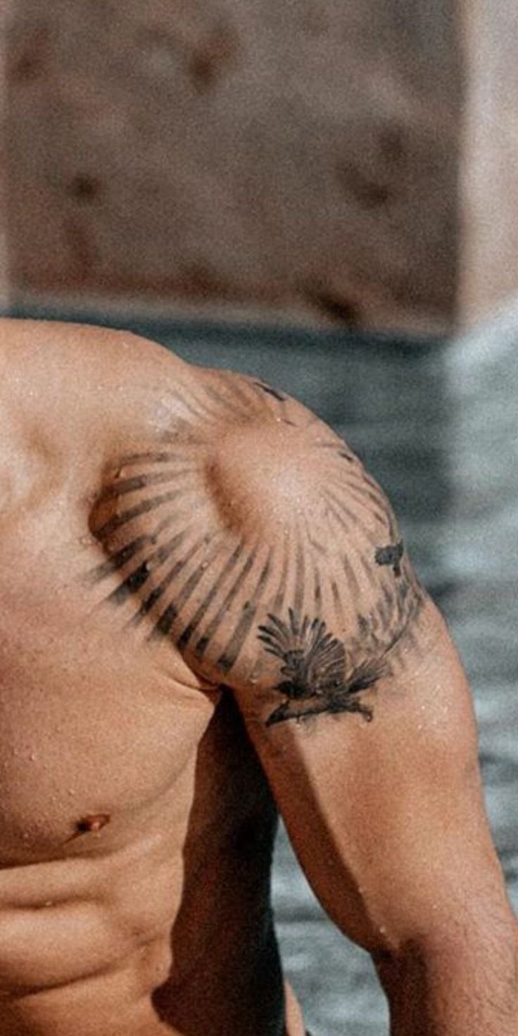 Detailed shoulder tattoos for men