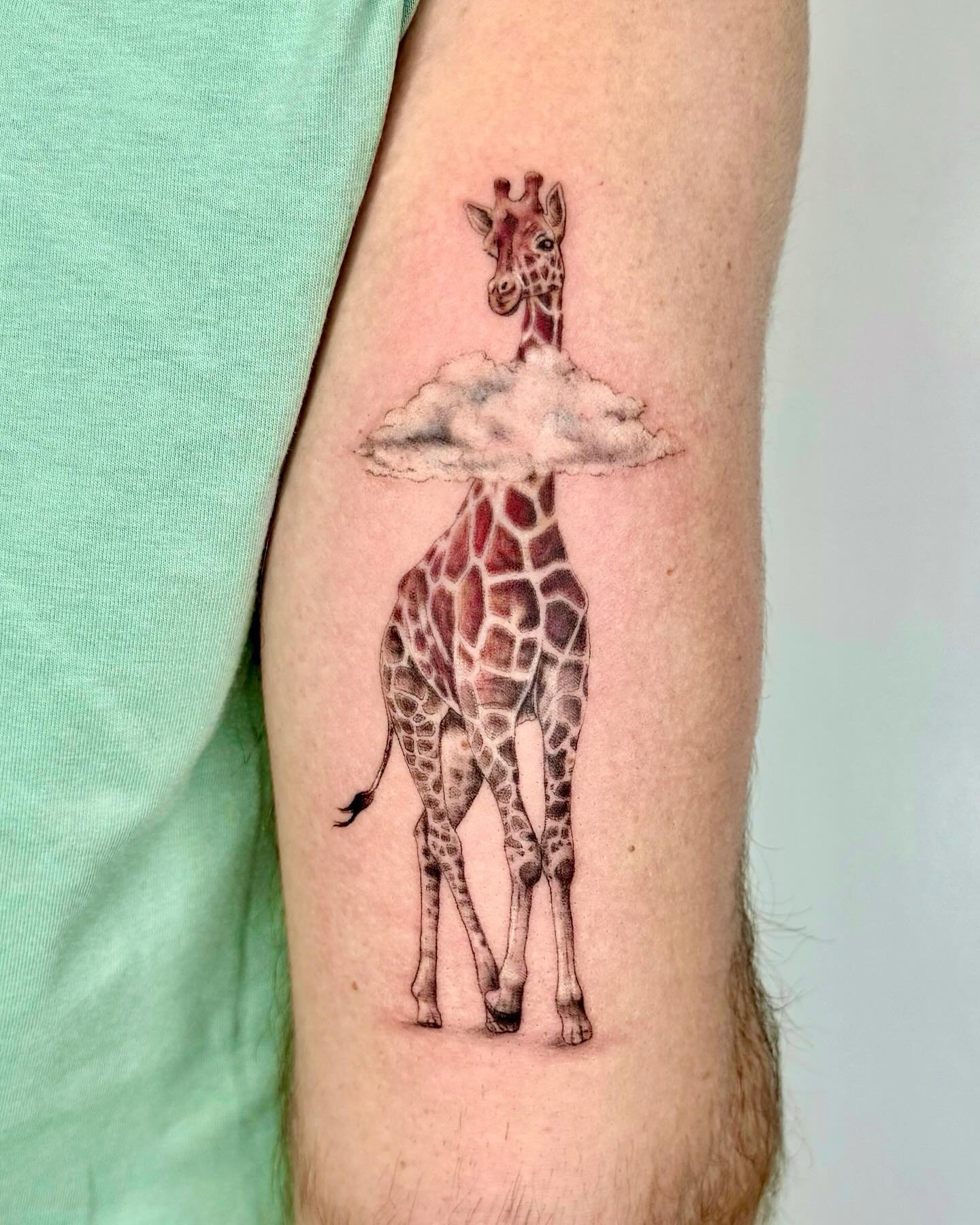 Realistic giraffe tattoo by noemesystattoo