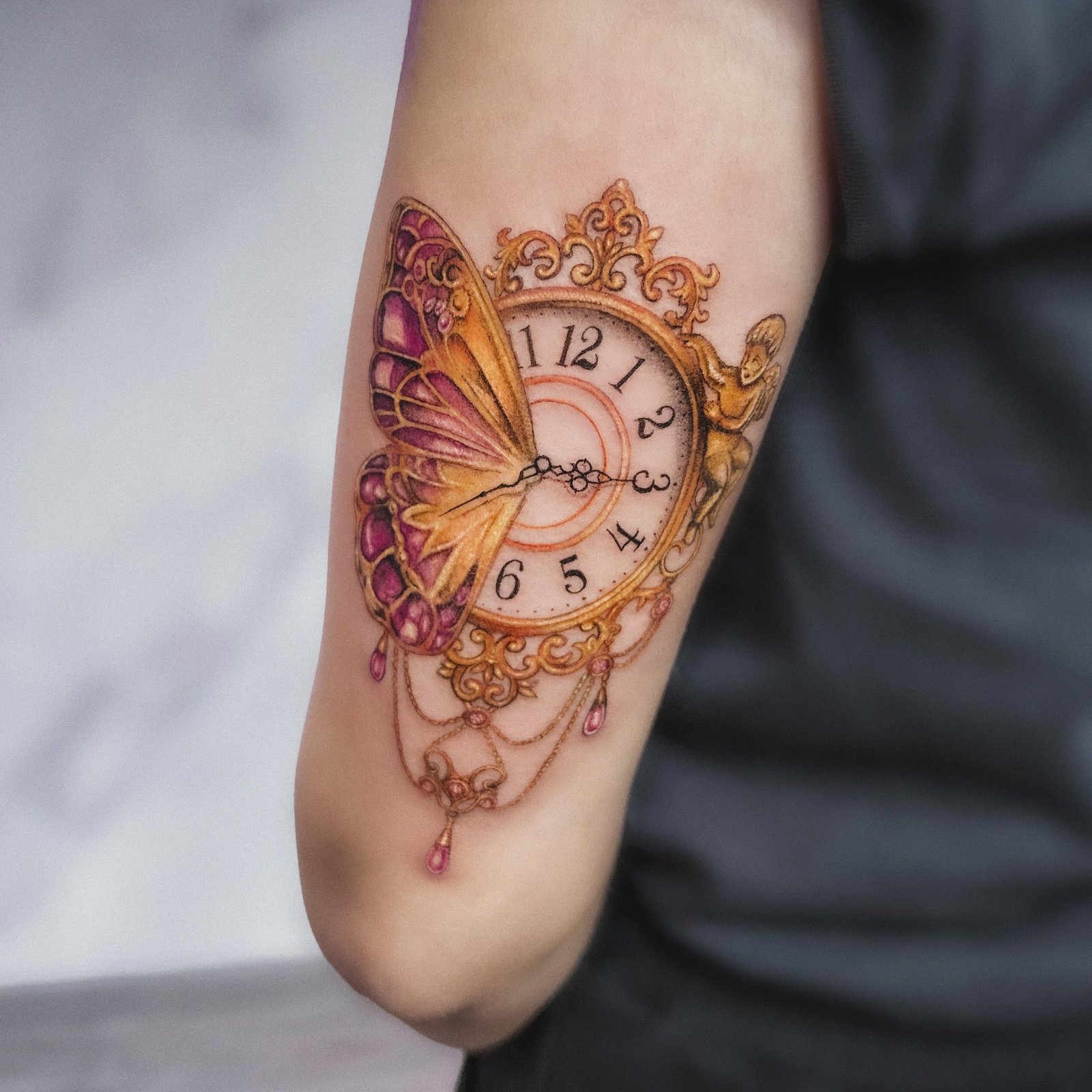 colorful clock tatt