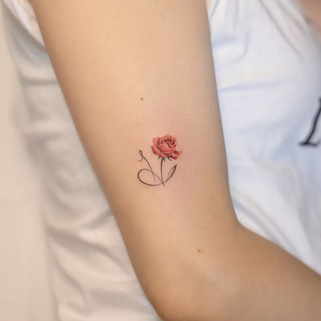 cute floral alhabet tattoo by handitrip