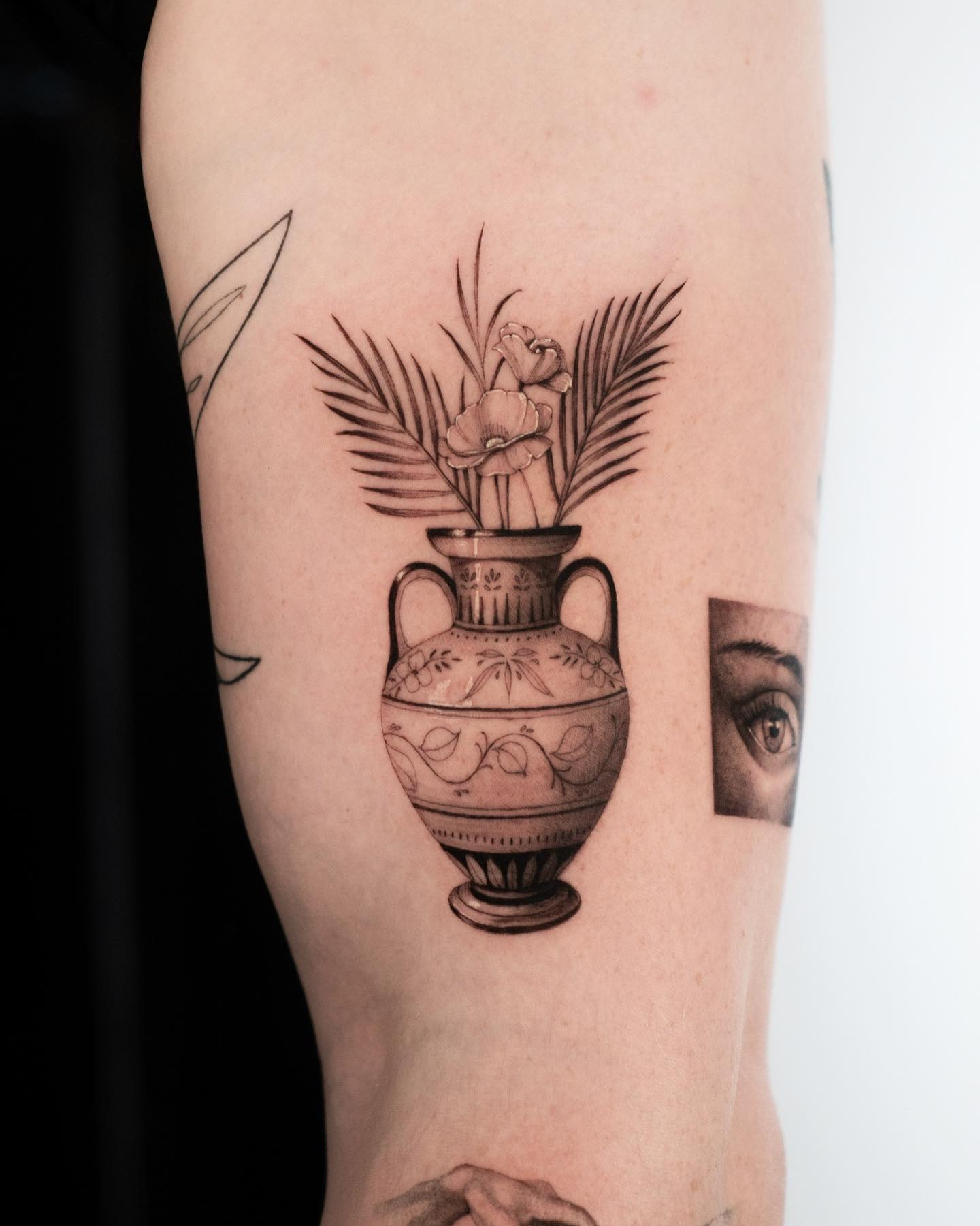 flower bouquet with vase tattoo by cavecreektattoo