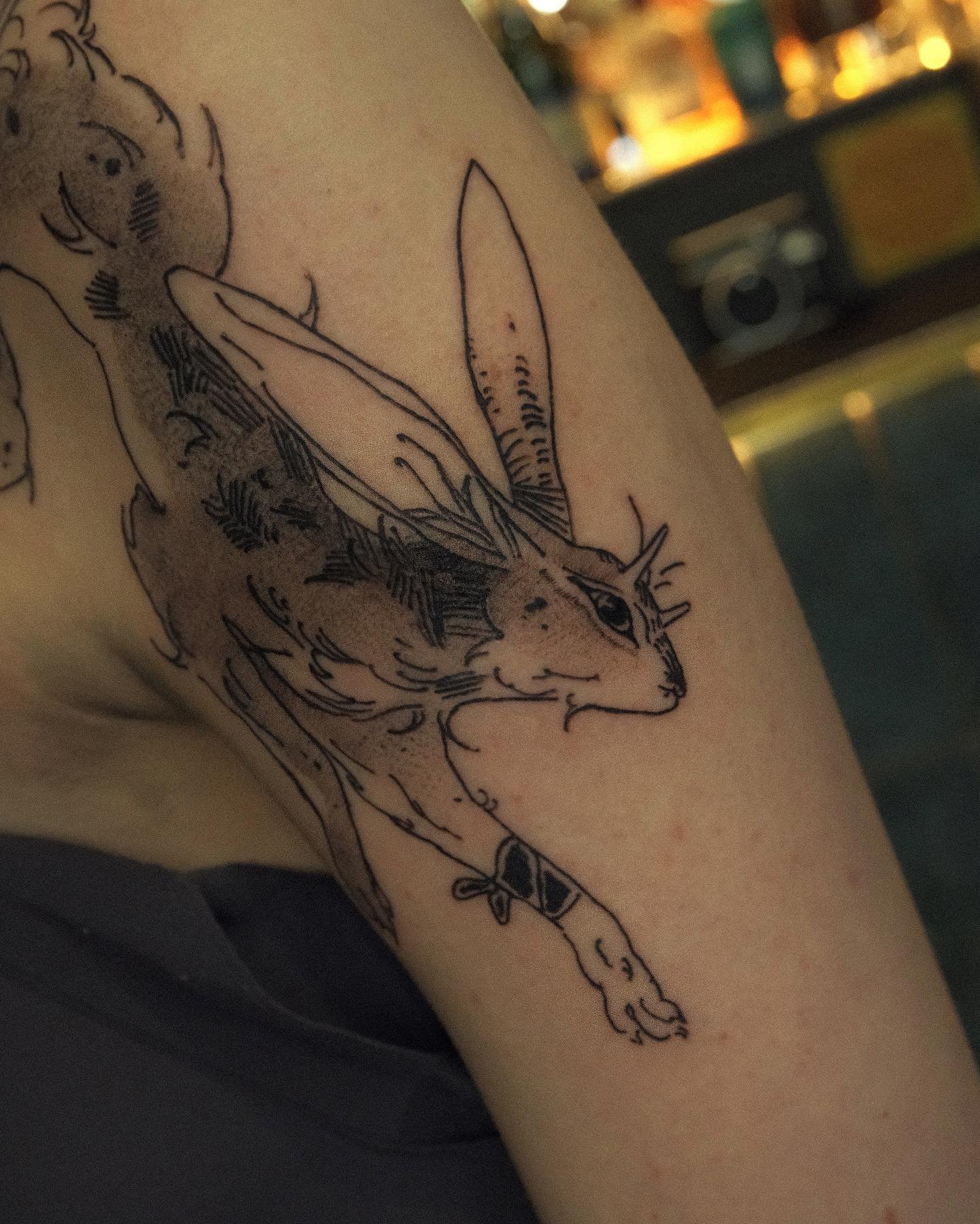 blackwork rabbit tattoos by yumi tiger