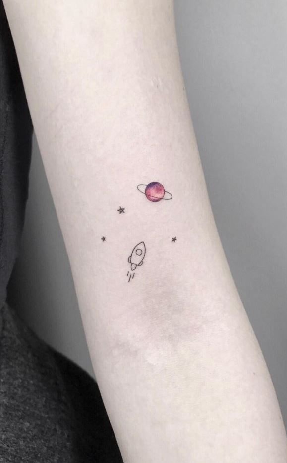 rocket and planet tattoo