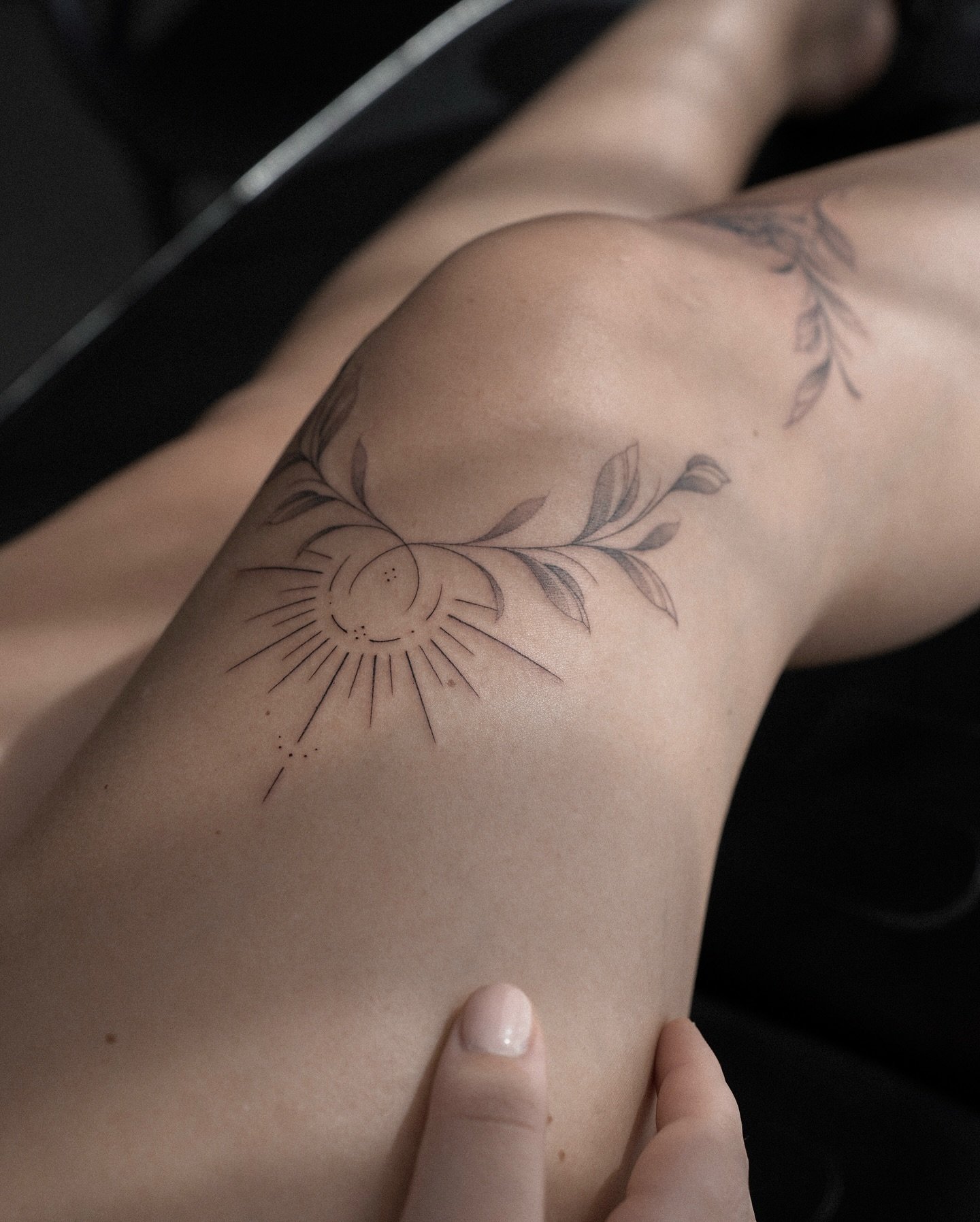 Black inked floral tattoos by lindacanters tattoo