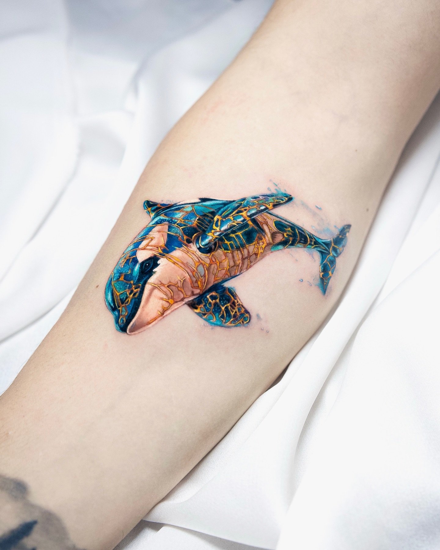 Blue whale tattoos by