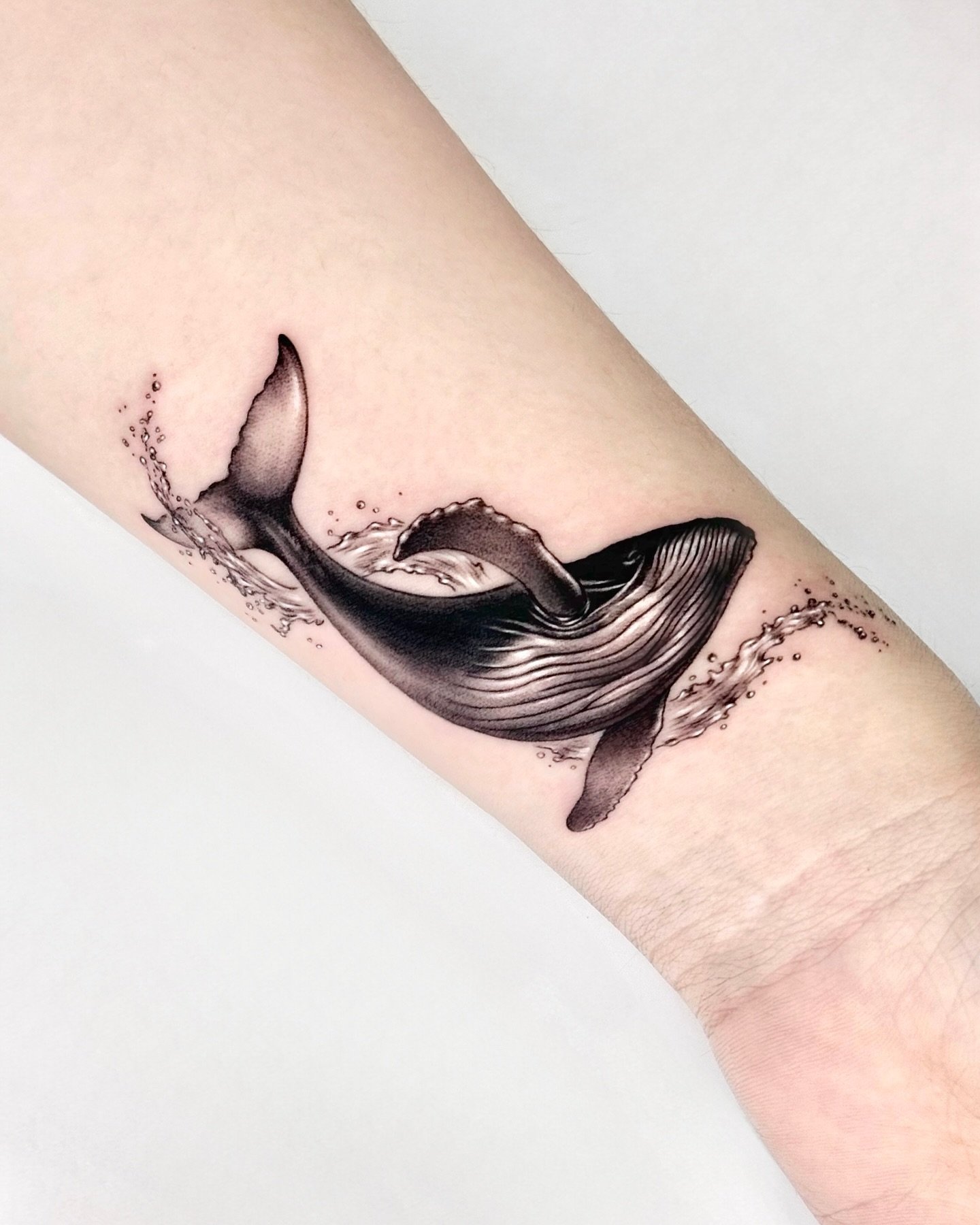 Whale on the forearm by doomil pet