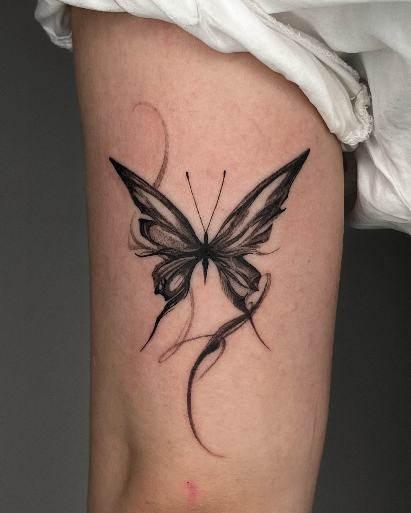 Abstract butterfly tattoo ideas by moku ttt